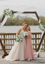 Dusty Rose girls' off-the-shoulder chiffon junior bridesmaid dress, outdoor wedding scene