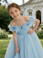 Close-up of bow details on light blue off-shoulder tulle flower girl dress
