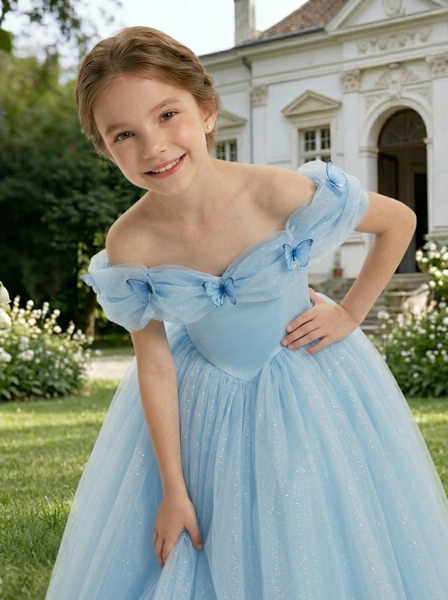 Close-up of bow details on light blue off-shoulder tulle flower girl dress