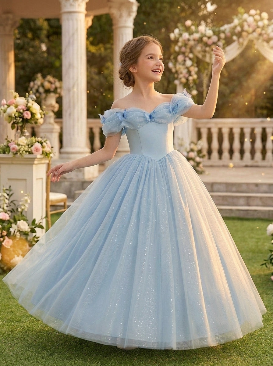Light blue off-shoulder bow tulle flower girl dress in an outdoor wedding setting