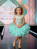 Girls mint beaded ruffle cupcake pageant dress on stage